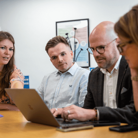 picture of ceo with team 